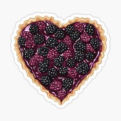 a heart shaped berry tart sticker on a white background with blackberries and rasp