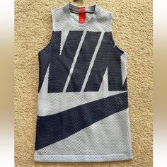 Nike Mesh Tank Size Small Brand New With Tags Navy Tops For Spring Streetwear, Blue Tank Top For Spring Streetwear, Spring Blue Tank Top For Streetwear, Navy Sports Tops For Summer, Summer Blue Streetwear Tank Top, Blue Tank Top For Summer Streetwear, Nike Sleeveless Tops For Streetwear, Nike Sleeveless Streetwear Tops, Blue Sports Tank Top With Graphic Print