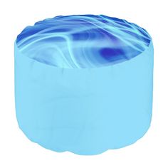 a round blue ottoman with wavy water on it's top and the bottom part of its cover