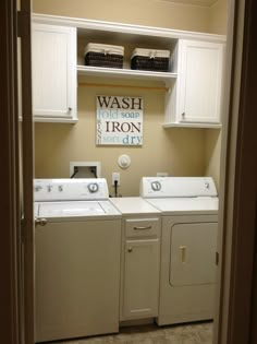 a washer and dryer sitting in a laundry room next to eachother