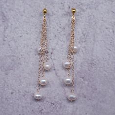 Elegant Pearl Earrings With Dangling Beads For Gift, 14k Gold Filled Dangle Pearl Earrings For Anniversary, Delicate Pearl Earrings With Dangling Beads Gift, Akoya Pearl Dangle Earrings Gift, Dangle Akoya Pearl Earrings For Gift, Gift Akoya Pearl Dangle Earrings, Gold Pearl Earrings With Dangling Beads As Gift, Bridal Dangle Earrings With Pearl Chain, Dangle Bridal Earrings With Pearl Chain