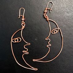 These moon shaped copper wire earrings are a lightweight, fun addition to any outfit. The dangle earrings feature a security hook ear wire to make sure they stay in place until the sun comes up. These earrings are made using reclaimed copper. Copper Wire Earrings, Wire Jewelry Earrings, Luna Moon, Celestial Earrings, Bijoux Fil Aluminium, Moon Shapes, Handmade Wire Jewelry, Handmade Wire, Wrapped Jewelry