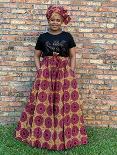 Embrace the beauty of African heritage as you wrap yourself in bold patterns and eye-catching designs. From geometric motifs to intricate floral prints, our maxi skirts exude elegance and charm, perfect for any occasion. AFRICAN Print Maxi skirt is uniquely made for you in mind. It comes with two convenient side pockets and a matching head wrap. It has an elastic waist with two straps that fits a waist up to 52". It is 45" long.HOWEVER, YOU CAN REQUEST WE REDUCE THE LENGTH TO YOUR DESIRED LENGTH Ankara Wrap Skirt, Ankara Maxi Skirt, Maxi Skirt Spring, Spring Skirt, African Print Maxi Skirt, Head Wrap Styles, Ankara Skirt, Print Maxi Skirt, Skirt Summer