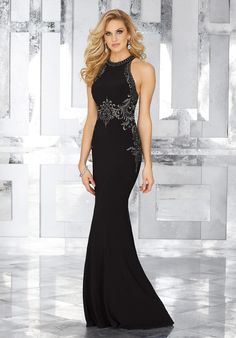 Turn heads in this MGNY long evening gown. The halter neckline starts the Crystal Beaded Embroidery that goes to the side panels and belt that accentuates the waist. MGNY 71625 is finished with a trumpet skirt, making it perfect for a mother of the bride dress, or any other special occasion dress. This dress is a final sale. No Returns or Exchanges. Long Jersey Dress, Madeline Gardner, New York Dress, Trumpet Dress, Dusty Rose Dress, Mori Lee, Long Evening Gowns, York Dress, Mermaid Fashion