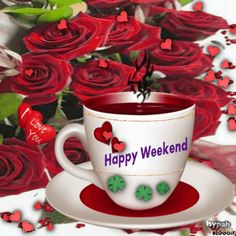 a coffee cup with the words happy weekend on it and red roses in the background