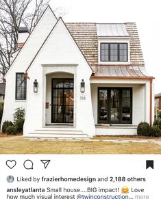 a white house with two windows and a metal roof is featured in the instagram post