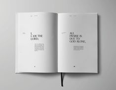 an open book with the words i am the lord written in black and white on it