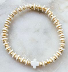 Speckled Cross Bracelet 4mm gold plated beads/ 6mm heishi 7 inches Gold Spiritual Beaded Cross Bracelets, Elegant Cross-shaped Beaded Bracelets For Gift, Gold Cross-shaped Beaded Bracelets For Gifts, White Cross-shaped Jewelry With 8mm Beads, Pink Adjustable Cross-shaped Bracelets, Self Tanners, Cross Bracelet, Baby Boutique, Initials