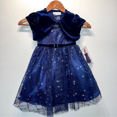 Nwts Jona Michelle Navy Dress Glitter Overlay Party Holiday Size 3t With Shrug. Shipped From A Non Smoking Home With No Pets. Blue Short Sleeve Princess Dress For Party, Blue Princess Dress With Short Sleeves For Party, Blue Princess Dress For Party Season, Blue Princess Dress For Holiday Party, Winter Party Dresses With Short Sleeves, Winter Party Dress With Short Sleeves, Blue Holiday Party Dress, Blue Festive Christmas Dress, Blue Princess Dress For Christmas Dress-up