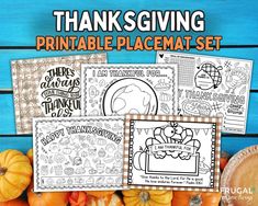 thanksgiving printable placemat set with pumpkins and other fall themed items in the background