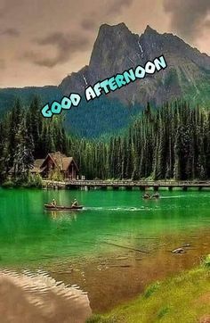 there is a lake with boats in it and the words good noon written above it