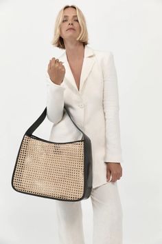 A throwback to St. Agni’s signature woven rattan style, the Rattan Basket Tote combines traditional techniques with a contemporary approach. Featuring a leather strap, side and base and a natural rattan front and back panel. The Rattan Basket Tote is ideal for carrying all your essentials and more. Rattan Style, Leather Factory, St Agni, Byron Bay Australia, Basket Tote, Woven Rattan, Rattan Basket, Sheep Leather, Leather Conditioner