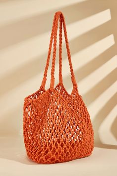 Carry your essentials in style with our Knotted Crochet Shoulder Bag. Featuring an intricate knotted design, this bag is perfect for adding a boho vibe to any outfit. Product code: CAC12F4G003KK Features:  Top handles Transparent design Unstructured body Material: 100%COTTON. Bohemian Shoulder Bag With Braided Handles For Shopping, Bohemian Woven Shoulder Bag For Shopping, Bohemian Woven Hobo Bag For Shopping, Bohemian Shoulder Bag For Shopping, Trendy Braided Shoulder Bag For Shopping, Trendy Open Weave Crochet Bag For Everyday Use, Trendy Open Weave Crochet Tote Bag, Trendy Open Weave Crochet Travel Bag, Bohemian Crochet Bag With Adjustable Double Handle