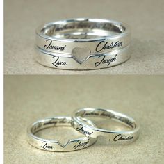 two wedding rings with names and hearts on them, one is engraved in the shape of a heart