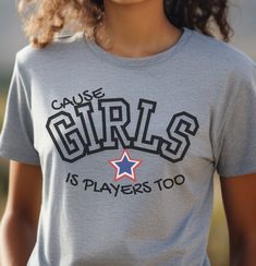 Elevate your sportswear collection with our "Girls Is Players Too" T-Shirt! This trendy and empowering tee is perfect for showcasing your athletic spirit and making a bold statement on and off the field. Designed with comfort and style in mind, it's ideal for all your sports and fitness activities. Key Features: Sports T-Shirt: Perfect for any athletic activity, from soccer to running. Athletic Apparel: Made from high-quality materials to keep you comfortable during workouts. Girls Sports Tee: C Sporty Athletic Heather T-shirt With Text Print, Cotton Sports Season T-shirt With Slogan, Cotton T-shirt With Slogan For Sports Season, Game Day Pre-shrunk Athletic Heather Tops, Game Day Tops In Athletic Heather, School Spirit Tops With Team Name, School Spirit Moisture-wicking T-shirt For Sports, Sporty Short Sleeve Tops For Cheerleading, Athletic Heather Sporty T-shirt With Text Print