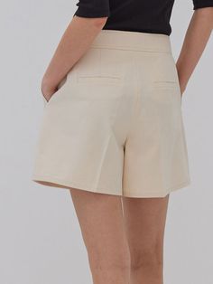 This is a feminine and modern pants by MangoManyPlease that is made out of high quality and sturdy material. With distinctive mood of the design and comfortable wear, you can style it for your feminine daily outfit.- Relaxed A line silhouette- Subtle gold button on high density fabric- Trendy and feminine mood Chic Cotton Bottoms With Built-in Shorts, Beige Wide Leg Bottoms With Built-in Shorts, Chic Bottoms With Built-in Shorts And Relaxed Fit, Modern Bottoms With Built-in Shorts For Spring, Chic Wide Leg Shorts With Belt Loops, Modern Cotton Bottoms For Work, Trendy Workwear Pants With Built-in Shorts, Elegant Wide Leg Shorts, Elegant Cotton Shorts With Pockets