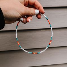 - RETRO LOVIN' -  This is the perfect handmade choker to spice up any of your outfits.  With orange, yellow, black, white, and turquoise seed beads, this necklace gives you that flawless western & boho vibe.  Including a 2 inch extension chain to fit however you want, comfortably.  If there is a different length, or design that you would prefer then message me!! I would be happy to customize any order unique to what you would love.   If you have any other questions or concerns regarding this choker, please contact me! *This is a handmade item, each choker will be made unique.  Meaning each choker may vary slightly compared to the picture.  Also, be aware that some materials can be fragile and need to be handled with special care.* Thank you for supporting my small business! ✯ follow on Pin Beaded Country Necklace, Western Beads Necklace, Boho Seed Bead Necklace, Black Western Necklace, Western Glass Bead Necklace, Beaded Jewelry To Sell, Country Necklaces Beads, Western Style Beaded Bracelets, Seed Bead Western Necklace