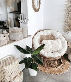 a room filled with lots of wicker furniture and decor on top of a tile floor