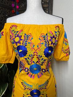 "Beautiful Floral Embroidered Dress - Handmade Embroidered Mexican Dress - Artisan Made Dress Beautiful hand embroidered dress! This has been made and brought directly from Puebla, Mexico. The dress has extremely detailed embroidery. The embroidery is 100% handcrafted. All the work on this dress has a professional skilled finish and the multicolor embroidered makes it look even more eye catching. The embroidery work is made with great quality thread. The eye catching will be on the embroidered w Traditional Dress With Multicolor Floral Embroidery, Summer Festival Floral Embroidered Fabric, Bohemian Floral Embroidered Fabric For Summer, Traditional Spring Embroidered Dress, Traditional Spring Embroidered Dress With Machine Embroidery, Traditional Fitted Dress With Geometric Embroidery, Fitted Traditional Dress With Geometric Embroidery, Traditional Multicolor Embroidered Dress For Spring, Traditional Cotton Dresses With Tonal Embroidery