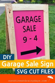 a pink garage sale sign with an arrow pointing to the right in front of it