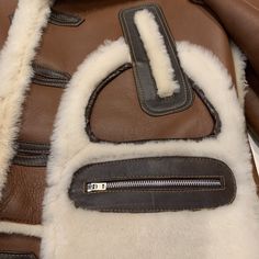 Daniels Leather Chocolate 3/4 Shearling Jacket - Dudes Boutique Brown Sheepskin Outerwear With Faux Fur Trim, Brown Sheepskin Outerwear With Faux Fur Lining, Luxury Brown Long Coat, Luxury Shearling Outerwear With Padded Collar, Brown Shearling Fur Coat With Faux Fur Trim, Brown Sheepskin Coat With Faux Fur Trim, Brown Sheepskin Fur Coat With Faux Fur Trim, Designer Shearling Leather Jacket With Padded Collar, Luxury Sheepskin Outerwear With Faux Fur Trim