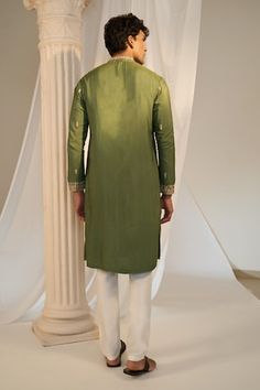 Green kurta with floral embroidered placket, cuff and scattered buttis. Comes with contrasting pyjama pant. - Aza Fashions Cotton Silk Traditional Wear With Embroidered Sleeves For Eid, Traditional Wear With Embroidered Sleeves For Eid, Traditional Wear With Embroidered Long Sleeves In Cotton Silk, Cotton Silk Traditional Wear With Embroidered Sleeves, Traditional Cotton Silk Wear With Embroidered Long Sleeves, Festive Traditional Wear With Embroidered Sleeves In Cotton Silk, Festive Cotton Silk Traditional Wear With Embroidered Sleeves, Festive Cotton Silk Salwar Kameez With Embroidered Sleeves, Designer Chanderi Kurta With Embroidered Sleeves