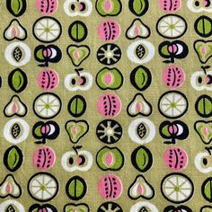 a close up view of a fabric with various designs on it, including leaves and circles