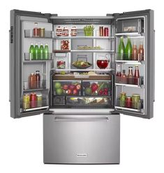 an open refrigerator filled with lots of food and drinks on the inside, including apples