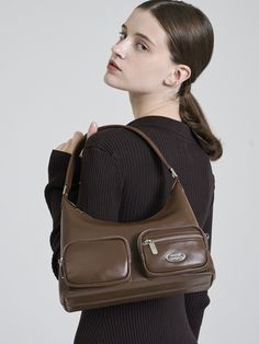 Editor's NotesEasy and stylish bags that go well with everyone- Minimal size shoulder bag- Practical 2 zipped pockets at front- High quality material that has natural gloss- Inside zipped pocketMeasurements (in.).- W x H x D: 11.0 in. × 8.7 in. × 3.1 in.- Pocket W x H: 4.7 in. × 3.5 in.- Weight 390gComposition & Care- Vegan leather, 100% polyester- Do not washDesigner- by occur source Stylish Bag, Bago, Vegan Leather, Bag Lady, Shoulder Bag, High Quality, Leather