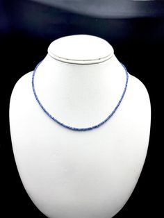 100% Natural Blue Sapphire Faceted rondelle shape beaded necklace with 925 Sterling Silver lobster clasp in metal wire. Details : - Gemstone: Blue Sapphire Calibration of beads: 2.50 millimeters Length: 16.00 inches Gross Weight: 28.05 carats Net Weight: 24.05 carats SKU: SINGLESTR004 100 % NATURAL BLUE SAPPHIRE BEADS FACETED RONDELLE SHAPE BEADS PERFECT CALIBRATED 2.50MM BEADS NECKLACE IN METAL WIRE 925 STERLING SILVER LOBSTER CLASP TOP QUALITY NATURAL BLUE SAPPHIRE RAW MATERIAL USED GENUINE PR Blue Oval Faceted Bead Jewelry, Adjustable Single Strand Sapphire Necklace, Blue Single Strand Necklace With Oval Beads, Blue Faceted Oval Beads Jewelry, Sapphire Rondelle Necklace As A Gift, Sapphire Rondelle Necklace For Gift, Elegant Sapphire Faceted Beaded Necklaces, Sapphire Rondelle Gemstone Beads Jewelry, Blue Rondelle Faceted Bead Necklace