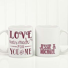 two white coffee mugs with love was made for you and me written on them