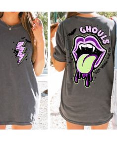 Unleash your spooky sass with our 'Mean Ghouls Just Wanna Have Fun' Halloween tee! Perfect for those who love a bit of frightful fun, this shirt combines eerie charm with a playful twist. Whether you're haunting the neighborhood or stirring up mischief at a party, our tee ensures you'll stand out in the best (or should we say, beast?) way possible. Embrace the spirit of Halloween and let your inner ghoul shine bright with every wear. Available in a range of sizes to fit every witch and warlock alike!" Edgy Halloween Tops With Character Print, Halloween Graffiti Print Short Sleeve Tops, Grunge T-shirt With Graffiti Print For Halloween, Grunge Graffiti Print T-shirt For Halloween, Witch And Warlock, Halloween Graffiti Print Crew Neck Top, Fall Graffiti Print Graphic Tee, Grunge Halloween T-shirt With Graffiti Print, Cheap Spooky T-shirt With Graphic Print