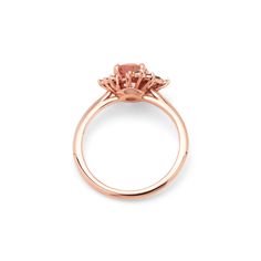 100% recycled precious metal Set in the center with a lovely approx. 1.25ct (6mm) round cut lab grown rosé sapphire. With a blush hue reminiscent of the color of morganite, our rosé sapphire features a slightly more saturated pink, and it offers a much better durability than morganite, making it ideal for an engagement ring! Available in two different tones: a hint of peach, or a hint of lilac One of a kind asymmetrical cluster halo featuring sparkly colorless lab grown diamonds, peppered with m Spinel Engagement Rings, Montana Sapphire Engagement, Montana Sapphire Engagement Ring, Engagement Ring Pictures, Montana Sapphire Ring, Natural Gemstone Ring, Engagement Rings Platinum, Montana Sapphire, Sapphire Engagement Ring Blue