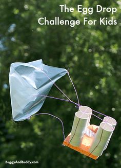 an egg drop kite is being flown in the air