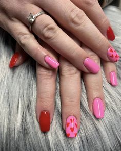 Elevate your nails with a playful combination of pink and red polish, featuring a striking red heart accent nail! Complete the look with our expert acrylic fill for lasting beauty and style. Heart Accent Nail, Valentine's Day Nails, Pink And Red, Red Heart, Valentine's Day