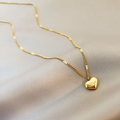 Gold Heart Pendant Necklace    Type: Necklace Color: Gold Condition: New Material: Alloy Package Includes: 1 Necklace Size:approx. 16 Inches     On Jun 5, 2024 at 09:54:59 PDT, seller added the following information: قلادات متدلية, Womens Chokers, Heart Pendant Gold, Luxury Necklace, Wedding Party Jewelry, Chain Choker Necklace, Chain Choker, Love Necklace, South Korean