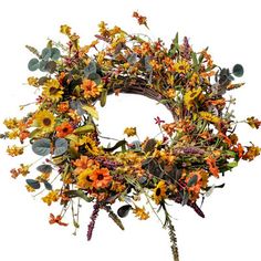 a wreath with orange and yellow flowers on it