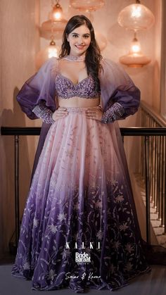 Simar is spreading her charm all the way! 💜  Let our beautiful lavender ombre lehenga hit the wedding shopping list this season.  It’s the szn to glow. ✨  This lehenga is worth opting for your reception look. 📸  .  Presenting Bride & Baraat VI,  Explore more bridal collection at our flagship store in Mumbai | Delhi.  You can also visit www.kalkifashion.com to shop online. 🛍  .  Style Code:  Lavender Lehenga- SG102124-1  Copy this code on our website to shop. Wedding Shopping List, Dress For Bride Sister, Ombre Lehenga, Lavender Ombre, Indian Bridesmaid Dresses, Reception Look, Wedding Shopping, Lehenga Designs Simple