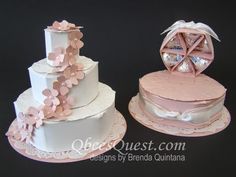 two wedding cakes decorated with pink and white flowers