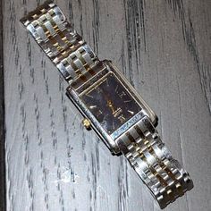 No Flaws Or Damages Perfect Condition Water Resistant Rare - Model Not Sold Anymore Classic Silver Watch Accessories With Rectangular Dial, Silver Watch Accessories With Bracelet Strap For Anniversary, Business Jewelry And Watches With Diamond Hour Markers, Silver Bracelet Strap Watch Accessories For Anniversary, Elegant Silver Watch Accessories With Stainless Steel Clasp, Elegant Silver Stainless Steel Watch Accessories, Silver Anniversary Watch With Bracelet Strap, Anniversary Silver Watch With Bracelet Strap, Classic Silver Analog Jewelry And Watches