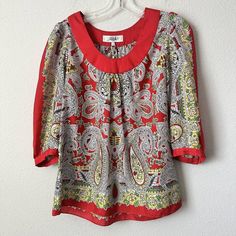 Tibi Red Yellow Paisley Floral Silk Blouse Sz 2 Nwot B-Lb Color: Red Yellow Description: Pullover Fabric: Silk Approximate Across Measurement: Bust 18" Length 24" Great Condition Smoke Free Pet Free Storage Paisley Floral, Fabric Silk, Silk Blouse, Red Yellow, Paisley, Size 2, Top Blouse, Womens Tops, Silk