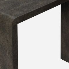 a close up of a black table with a white square in the center on a white background