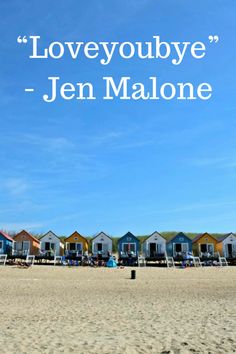 there is a quote on the beach that says loveyoubye - jean malone