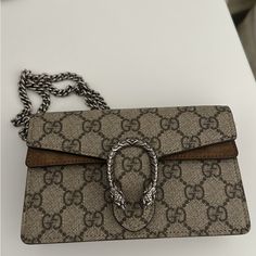 The Bag Is In Gorgeous Condition. Canvas Bag And Has Taupe Suede Detailing. No Scratches Or Marks:) Offers Accepted. Brown Gucci Crossbody Bag, Gucci Clutch Shoulder Bag With Gold-tone Hardware, Gucci Pouch Bag With Detachable Strap, Beige Gucci Bag With Detachable Strap, Gucci Beige Bag With Detachable Strap, Designer Gucci Bag With Branded Hardware, Luxury Brown Shoulder Bag With Branded Hardware, Designer Brown Bags For Everyday Luxury, Gucci Brown Top Handle Shoulder Bag