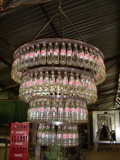 a chandelier made out of empty water bottles