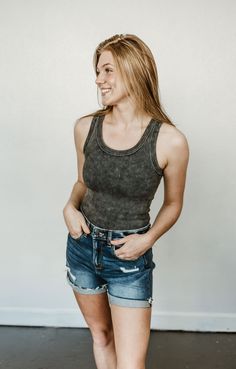 "Expertly crafted, the Darling Jean Shorts feature a cuffed design and a folded raw hem for a stylish touch. With a comfortable inseam of 3.75 inches, these shorts are made with 71% cotton, 26% polyester, and 3% spandex for a perfect fit. Elevate your summer wardrobe with these trendy and versatile shorts." Wallet Bag, Sweater Blouse, Cropped Tank Top, Jeans Dress, Bag Straps, Summer Wardrobe, Dress Accessories, Jean Shorts, Denim Shorts