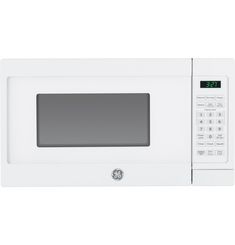 a white microwave oven with an electronic display on the front and side panel showing the time