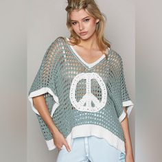 Open Crochet Oversized Peace Sign Sweater - Pol Spread Good Vibes With This Oversized Peace Sign Sweater! The Chunky Crochet Adds Texture While The Wide Sleeves And V-Neck Keep It Breezy For Summer Or Fall. With Its Cute Colored Trim And Playful Peace Sign, You'll Be Rockin' Good Style And Good Vibes. Fabric Contents: - 60% Cotton, 40% Nylon Approximate Measurements: (Inches, Garment Laying Flat) Small:&Nbsp; 29" Bust, 29" Waist, 21" Length&Nbsp; Medium:&Nbsp; 30" Bust, 30" Waist, 21.5" Length L One Size Casual Poncho For Spring, Casual Poncho With Batwing Sleeves, Oversized Knit Poncho For Summer, Oversized Sweater For Spring Vacation, Casual Batwing Sleeve Poncho For Spring, Oversized Sweater For Vacation In Spring, Oversized Crochet Sweater For Summer, Oversized V-neck Poncho For Spring, Casual Open Knit Poncho One Size