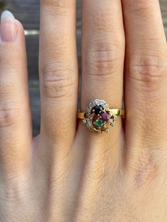 Total Weight: 3.5 grams Size: 6.5 Band Width: 2.1-2.5mm  Spinel: 2.6mm Diamonds: 1.1mm Emerald: 2.9mm Condition: In great condition showing little wear with no damage.  All gold has been thoroughly checked with an Olympus XRF spectrometer. It is guaranteed 14k gold.  All our jewelry is properly washed and disinfected to ensure customers get clean items with every order.  Returns accepted but may be subjected to a restock fee.  Please message with any questions:) Diamond Emerald Ring, Smaragd Ring, Jewelry Real, Emerald Ring, Estate Jewelry, Rings Statement, Halloween Shopping, Statement Rings, Emerald