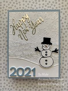 a happy new year card with a snowman on the front and words that say happy new year